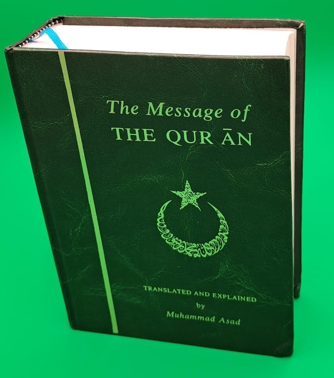 Al-Quran Al-Karim: Muhammad Asad's  The Message of the Qur'an, single-volume  English translation and commentary of the Quran, 1980 edition.